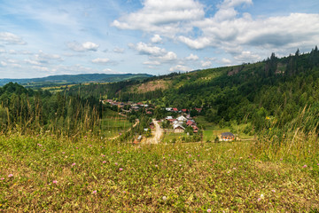 Fototapeta na wymiar Nova Bystrica village with hilly surrounding in Slovakia