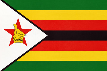 Republic of Zimbabwe national fabric flag, textile background. - obrazy, fototapety, plakaty