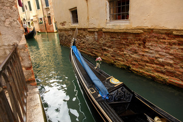 Fototapeta na wymiar Gondola on water, Venice, Italy