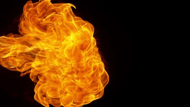 Super Slow Motion Shot of Fire Flame Isolated on Black Background at 1000fps.