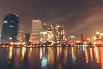 Vintage style of blur city lights background. Bokeh background.
