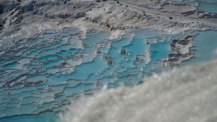 Natural travertine pools and terraces in Pamukkale. It is on the World Heritage List and is under...