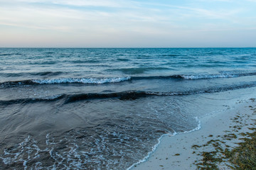 Horizon of seascape, sandy beach in Dubai, United Arab Emirates
