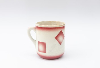 Old porcelain coffee mug with geometrical, abstract pattern - retro midcentury design - mass production china ware