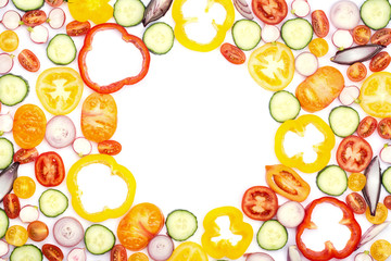 Bright colorful vegetables background with copy space. Salad ingredients, tomatoes cucumber peppers onions cut on white, top view, selective focus