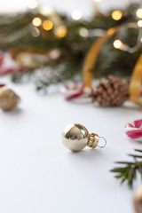 .Christmas decorative background with pine branches,candy and christmas ball on the white background. Christmas Holiday Concept. Christmas Ball Close up. Copy space