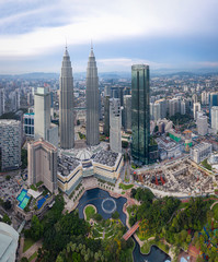 Obraz premium Aerial view of Kuala Lumpur city skyline at daytime in Kuala Lumpur, Malaysia.