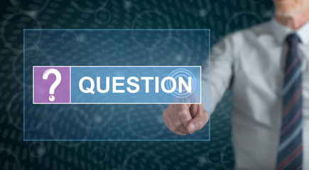 Man touching a question concept