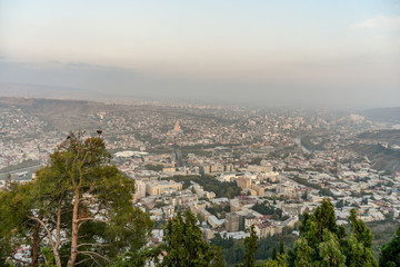 Obraz premium Old Tbilisi, Tbilisi, Georgia, October 17, 2019, Arial view of Tbilisi from Medieval castle of Narikala and Tbilisi city overview, Republic of Georgia, Caucasus region