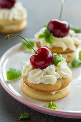 Mini cake with whipped cream