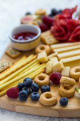 Variety of appetizers gathered on one board