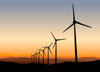 Wind Power Turbine on Orange Sunset