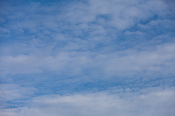 Blue sky background with clouds.