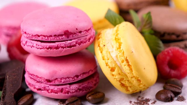gourmet French macaroons with berry fruit and chocolate