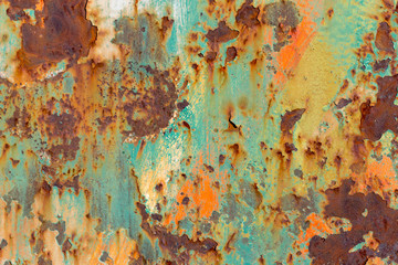Rusty Colored Metal with cracked paint, grunge background