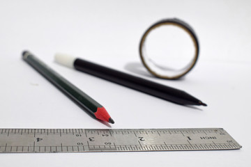 pencil, ruler, marker on a white background