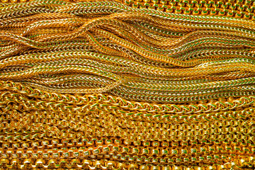 Beautiful gold necklace texture for background, Closeup