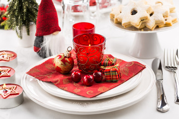 Christmas And New Year Holiday Table Setting.  Place setting for Christmas Dinner. Holiday Decorations.