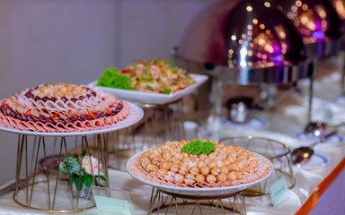 Food Buffet Catering Dining Eating Party Sharing Concept.people group catering buffet food indoor in luxury restaurant with meat colorful fruits and vegetables