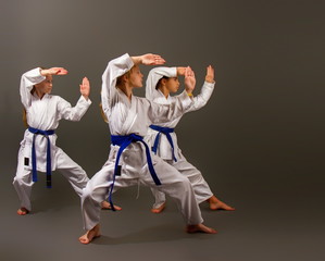 three karate girls