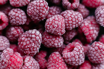 Raspberries, frozen raspberries, berries covered with hoarfrost. Background.Raspberry Background