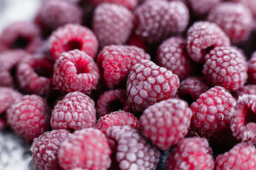 Raspberries, frozen raspberries, berries covered with hoarfrost. Background.Raspberry Background