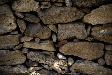 old stone wall of stones