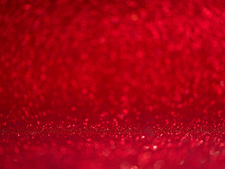 Christmas and Valentine days abstract Red glitter bokeh lights, Happy holiday new year, defocused.