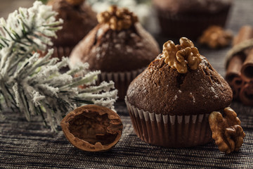Christmas chocolate delicious muffins sprinklad with sugar powder and wallnut on top