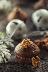 Christmas chocolate delicious muffins sprinklad with sugar powder and wallnut on top