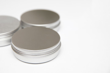 Lip balm in metallic tins