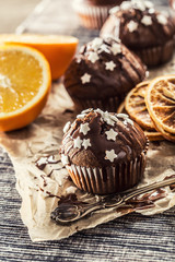 Christmas chocolate delicious muffins sprinkled with topping and white stars