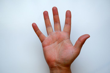 White Male Hand Shows Five on White Background
