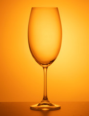 Wineglass orange background thin black contour