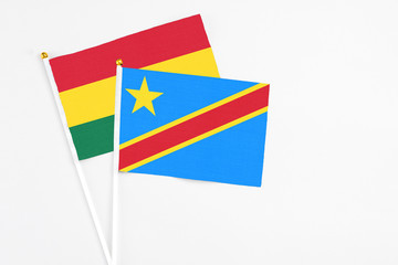 Congo and Ghana stick flags on white background. High quality fabric, miniature national flag....
