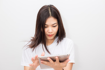 Fototapeta premium Business smiling women with tablet computer on white background