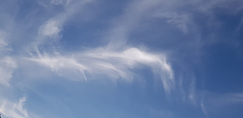 white clouds in the blue sky