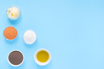 spa set natural products for self-care at home on turquoise background. flat lay, top view