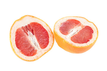 Fototapeta na wymiar Close-up of a split ripe pink grapefruit (Citrus paradisi), isolated on white background.