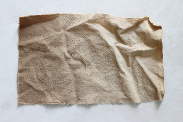 Fototapeta na wymiar old cloth texture on white floor background