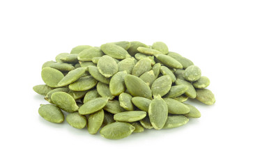 pumpkin seeds on white background.