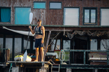 Handsome Young Man Kayaking
