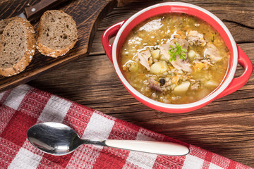 Barley soup with vegetables and chicken.