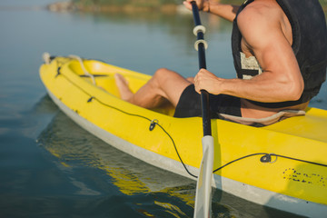Handsome Young Man Kayaking