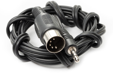 Fototapeta premium 5-pin DIN male cable to 3.5mm stereo male jack. 5 pin/din old socket to 3.5mm jack adapter