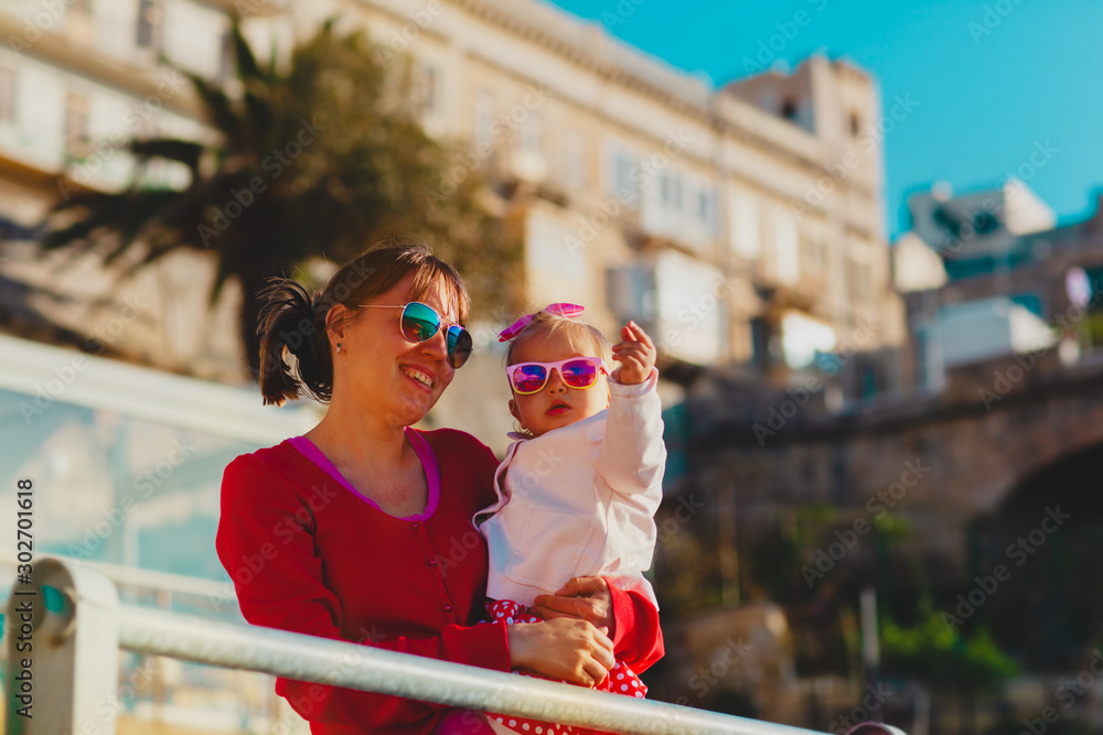 Wall mural happy mother and little daughter travel in malta