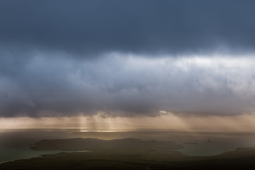Stormy sky and coast seen from Ronas Hill, highest point of the Shetland Islands, rising 450 meters...