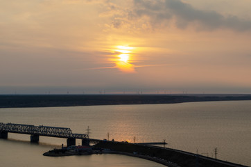 Fototapeta na wymiar Sunrise over the wind farms. View over Volga river, Ulyanovsk, Russia.