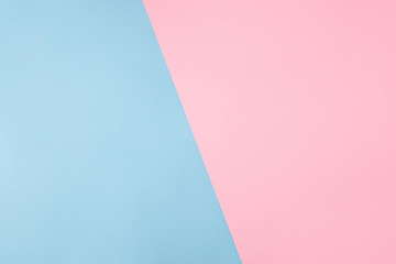 Photo of shared divided into two parts background harmonically soft pastel colored empty space for filling text idea banner billboard pink and blue colors