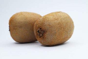 juicy kiwi on a white background. funny smiley with fruits
